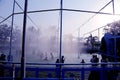 Teenage group of people enjoying holiday in water park.